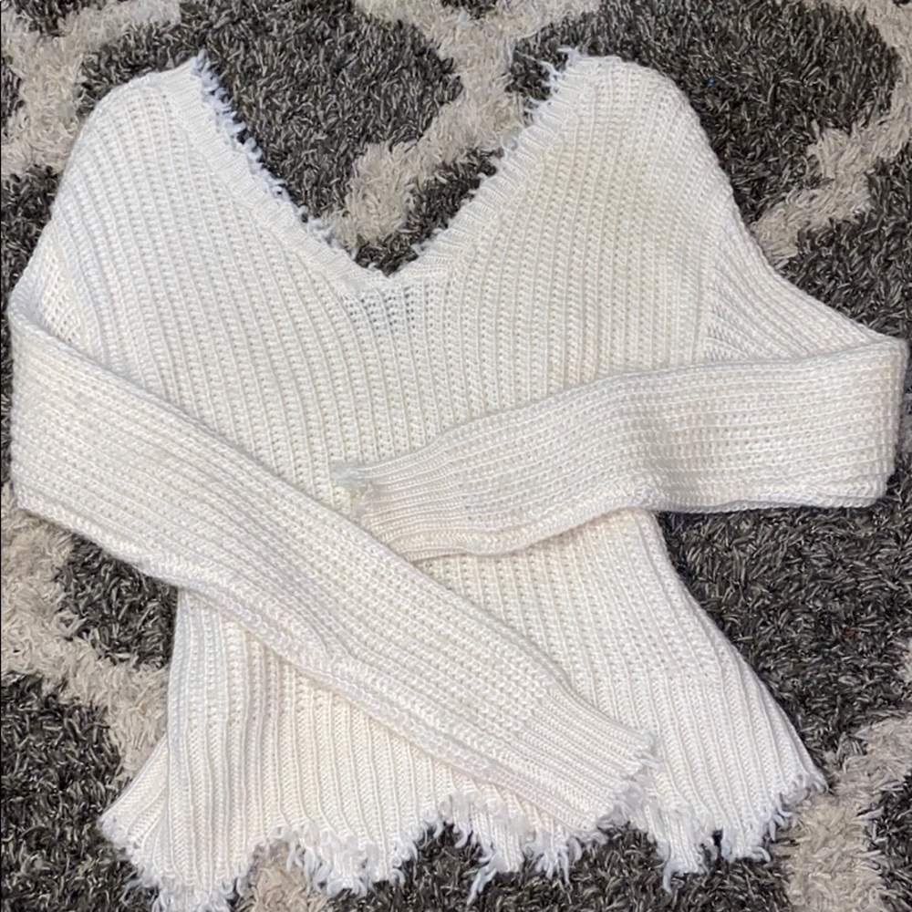 Off the shoulder distressed sweater